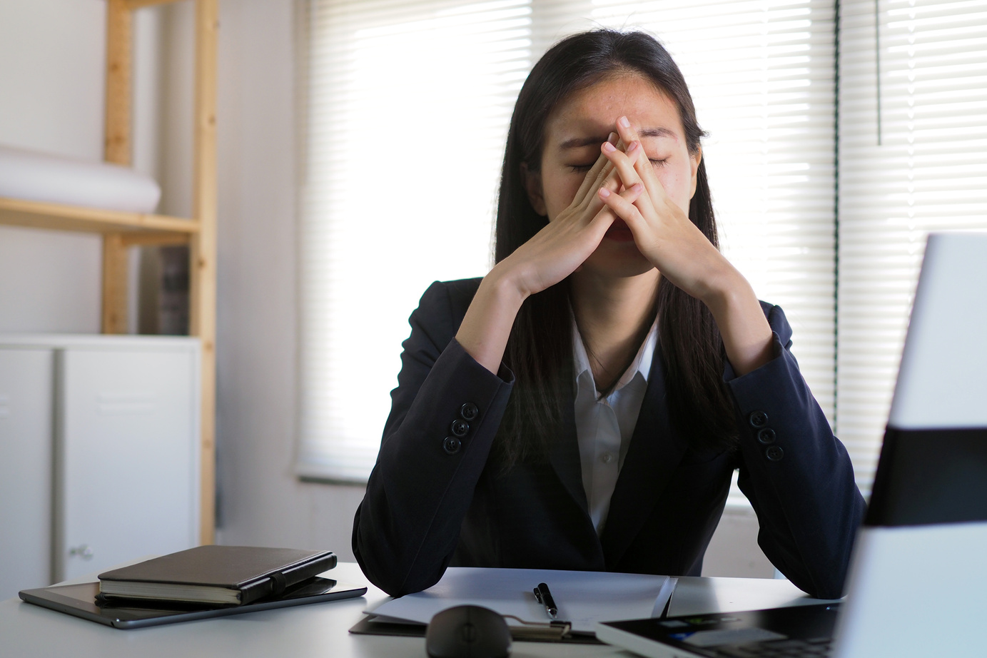 Woman Experiencing Fatigue at Work